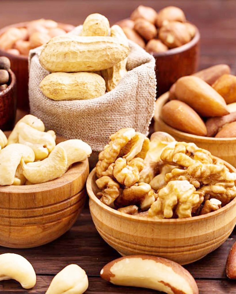 Variety of nuts: walnut, hazelnut, cashew, peanuts,  pine nuts and other